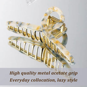 Close-up of FAELBATY hair clip showing strong spring mechanism