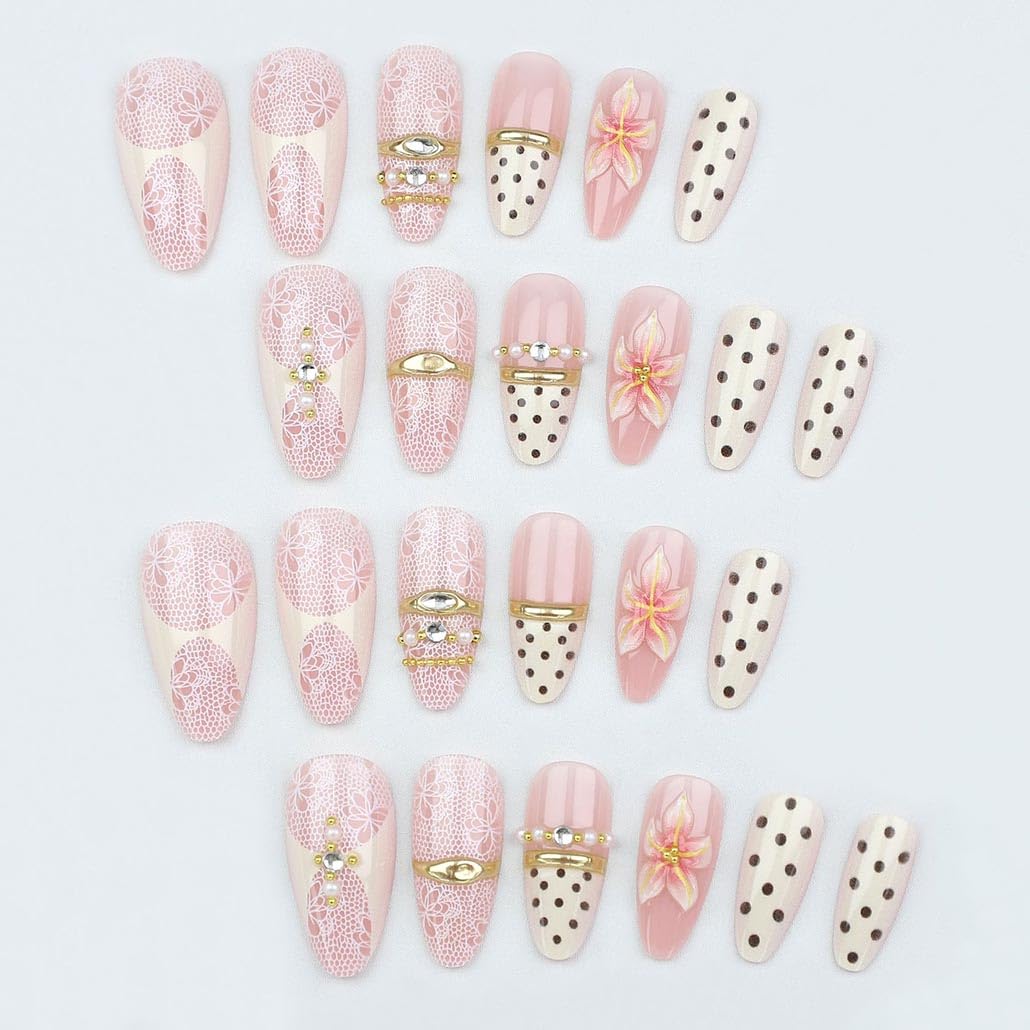 Close-up of Foccna Almond Press On Nails showcasing gold metal and rhinestone details