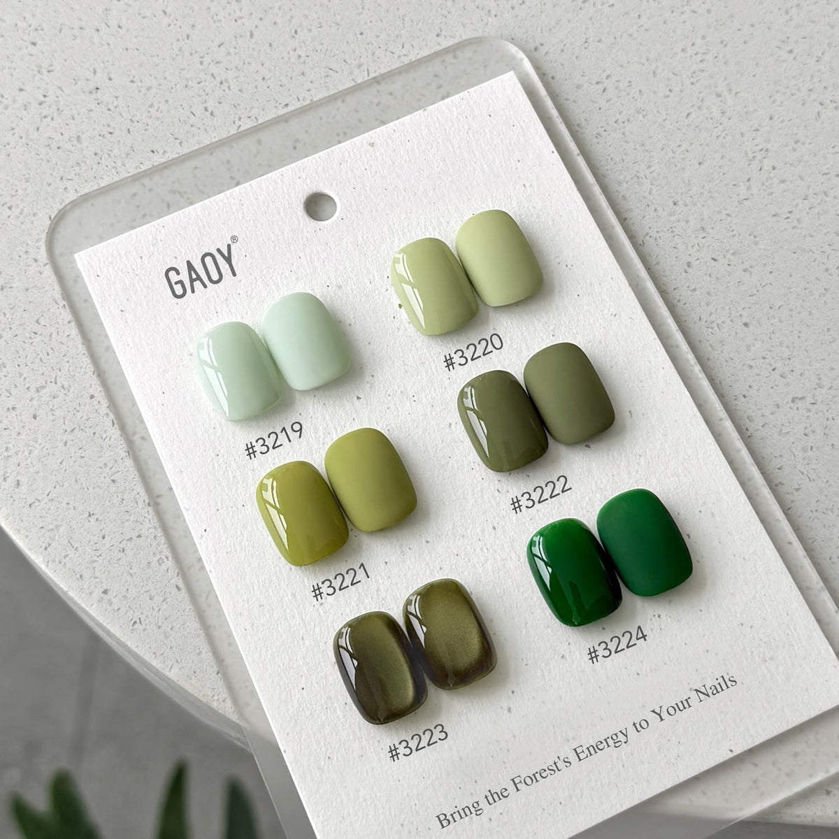 Close-up of GAOY gel polish bottle with cat eye magnet