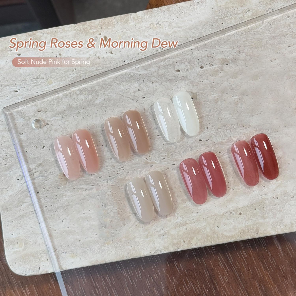 Close-up of GAOY gel polish bottles in pink and nude shades