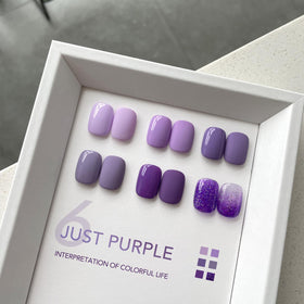 Close-up of GAOY gel polish bottles in purple shades