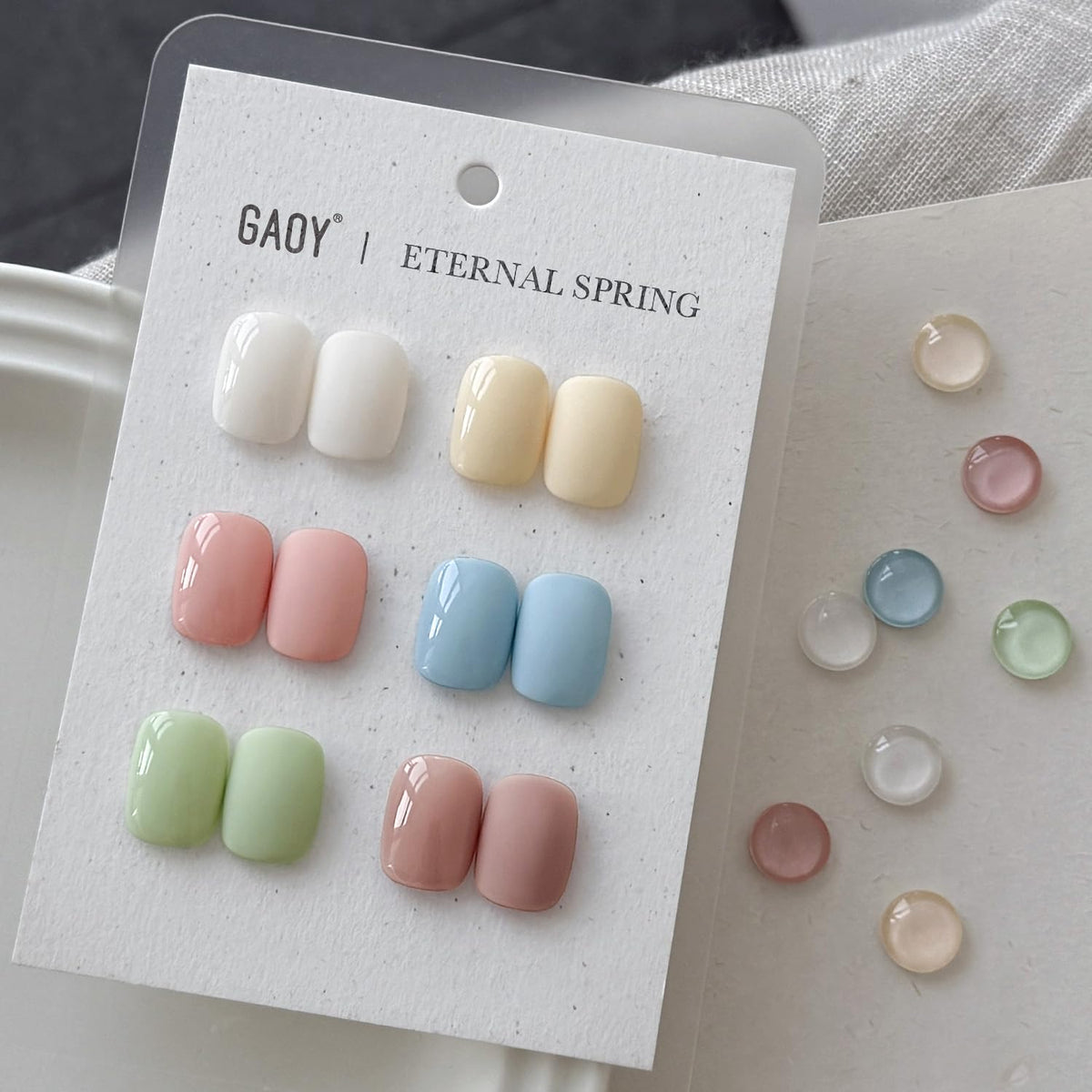 Close-up of GAOY gel polish bottles showing vibrant pastel colours
