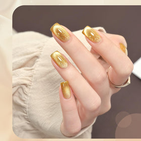 Close-up of GAOY Gold Glassy Cat Eye Gel Nail Polish applied on nails
