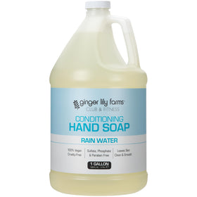 Close-up of Ginger Lily Farms Hand Soap bottle with creamy lather