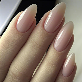 Close-up of GLAMERMAID Nude Pink Press on Nails showing shine