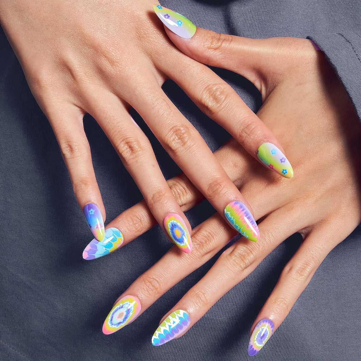 Close-up of GLAMERMAID tie-dyed design on press on nails