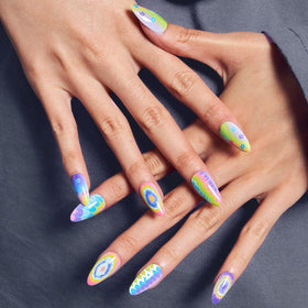 Close-up of GLAMERMAID tie-dyed design on press on nails