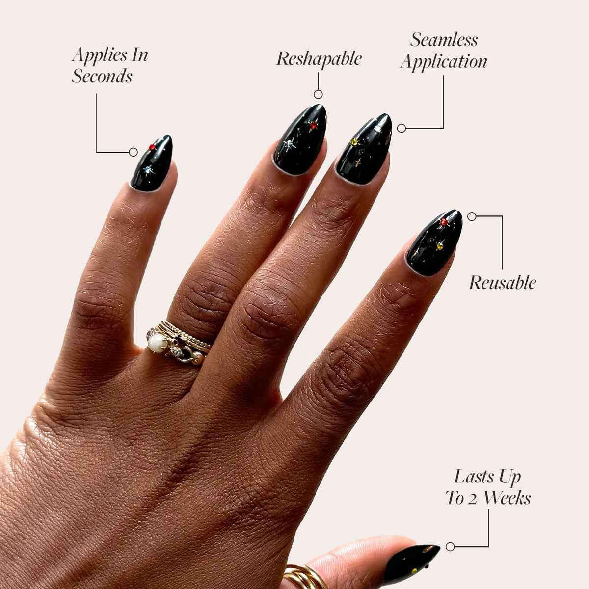 Close-up of Glamnetic Press On Nails Short Almond showing gold foil sparkles
