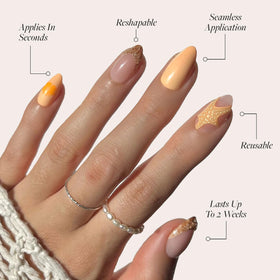 Close-up of Glamnetic Press On Nails with seashell designs