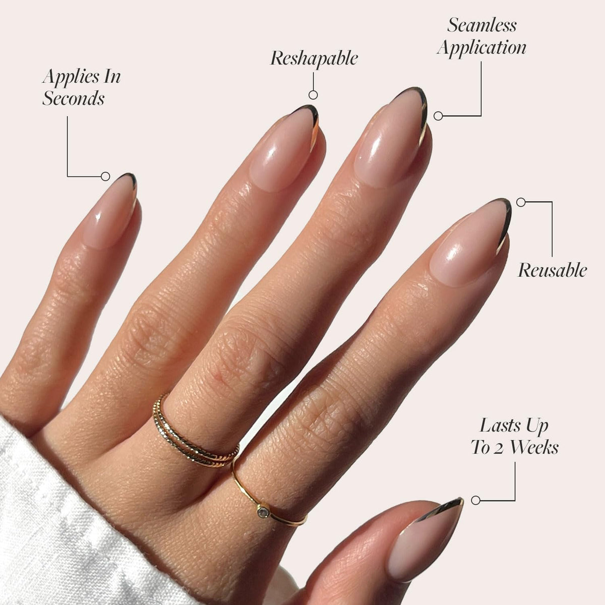 Close-up of Glamnetic Short Almond Gold French Tip nails