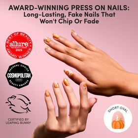 Close-up of Glamnetic Velvet Pumpkin Nails with gold foil