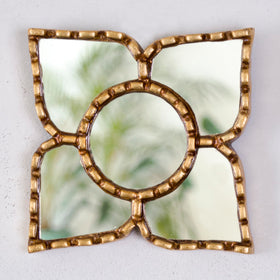 Close-up of gold leaf gilding on DecorContreras mirror