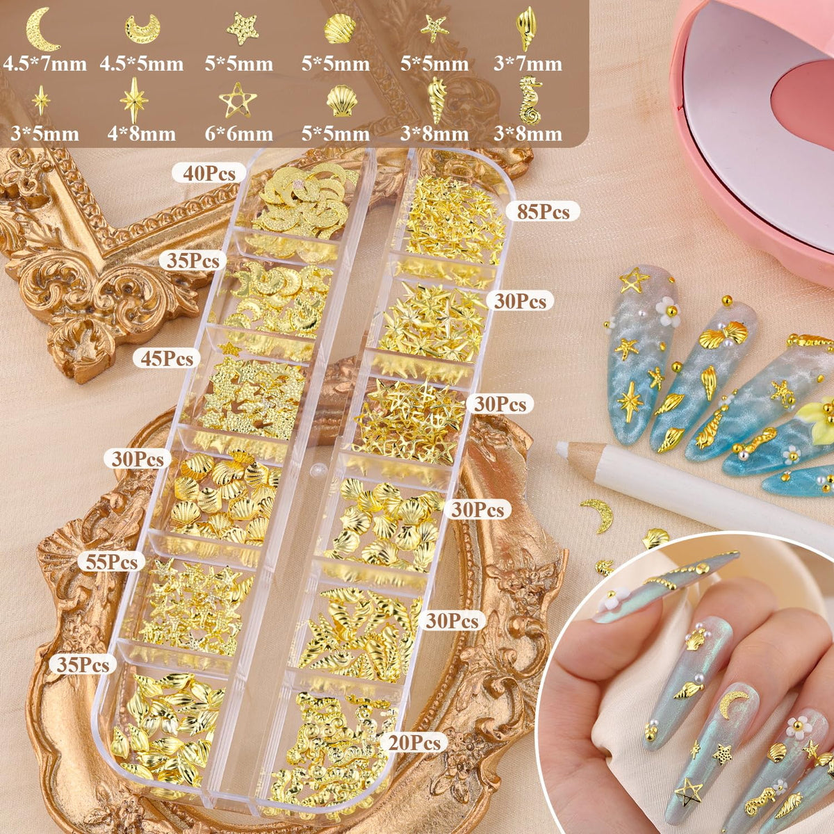 Close-up of gold ocean and star nail charms from BELLEBOOST