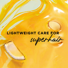 Close-up of Hair Food Coconut & Argan Oil Heat Protectant Spray nozzle