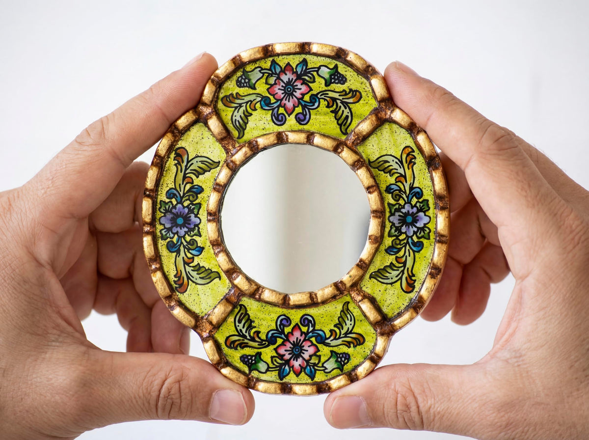 Close-up of hand-painted floral brushstrokes on DecorContreras Small Oval Wall Mirror
