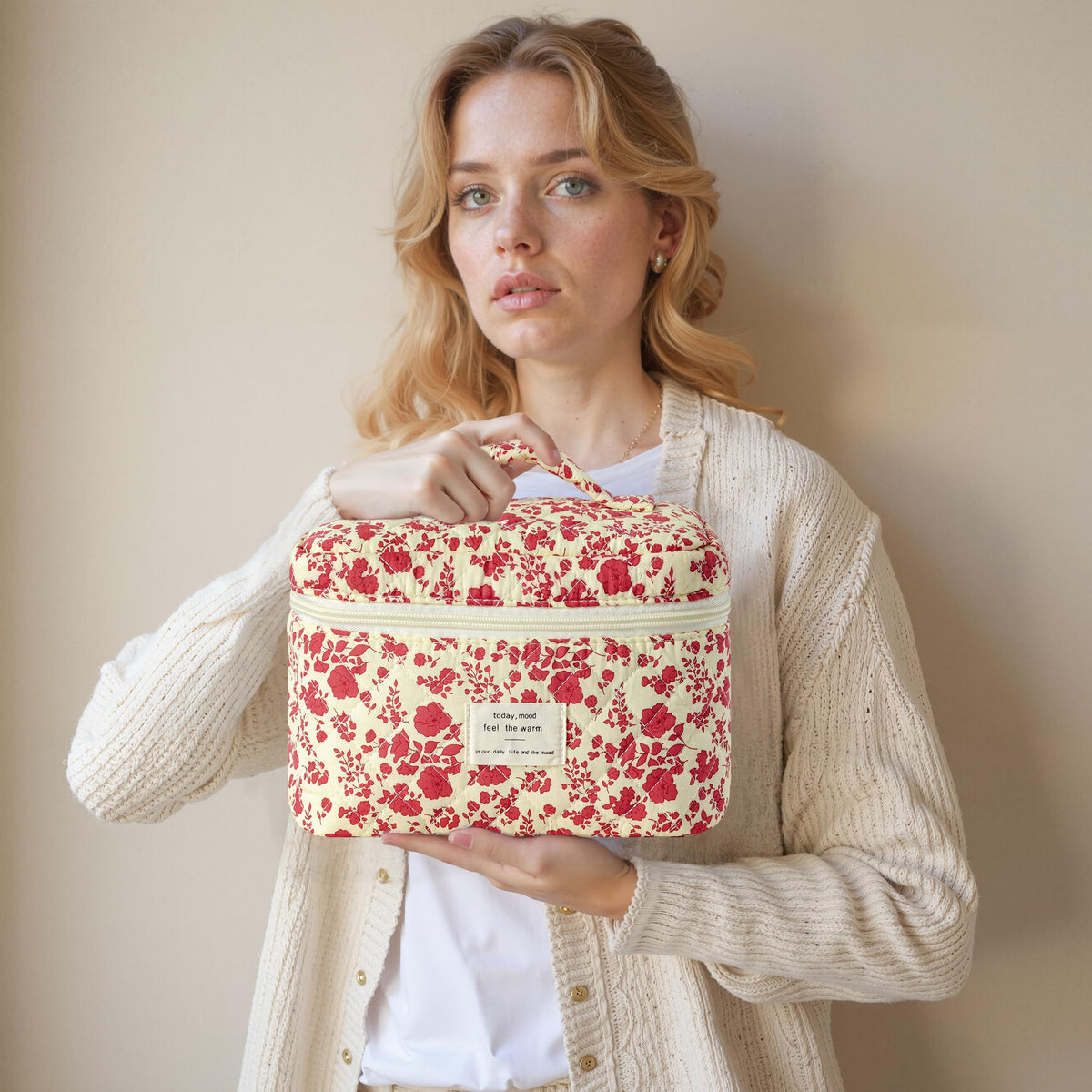 Close-up of HBselect makeup bag zipper detail and floral design