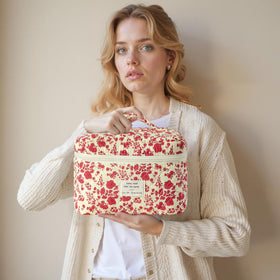 Close-up of HBselect makeup bag zipper detail and floral design