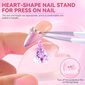 Close-up of heart-shaped acrylic nail holder from ESUOHYM