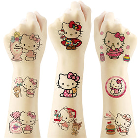 Close-up of Hello Kitty tattoo designs on paper