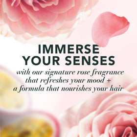 Close-up of Herbal Essences Rose Hips and Passionfruit conditioner bottle
