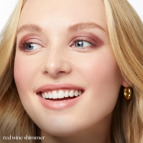 Close-up of Julep Eyeshadow 101 Crème-to-Powder Stick Red Wine Shimmer tip