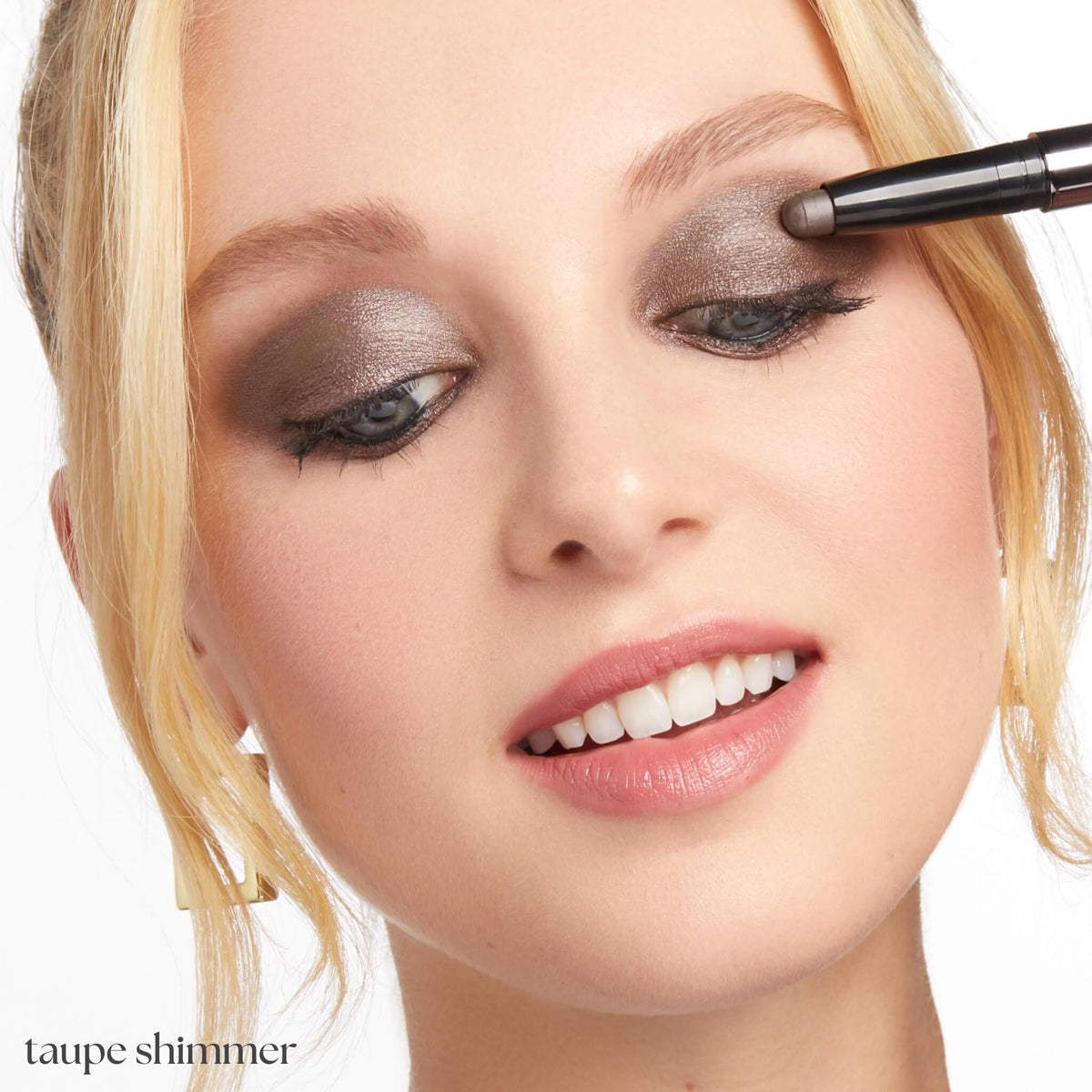 Close-up of Julep Eyeshadow 101 Crème-to-Powder Stick Taupe Shimmer tip