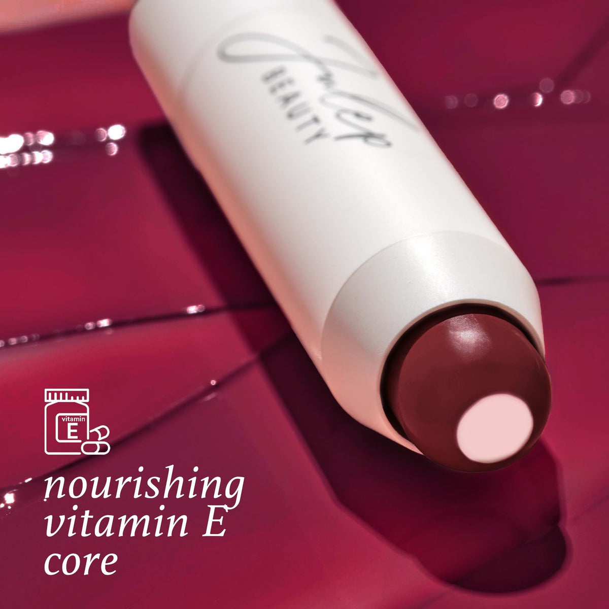 Close-up of Julep It’s Balm Black Cherry tube