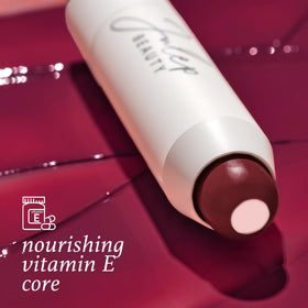 Close-up of Julep It’s Balm Black Cherry tube
