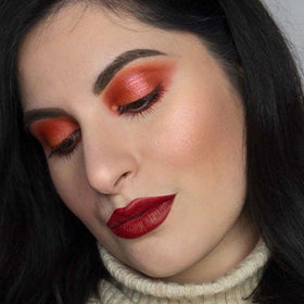 Close-up of Kaely lip liner pencil with dark wine red shade