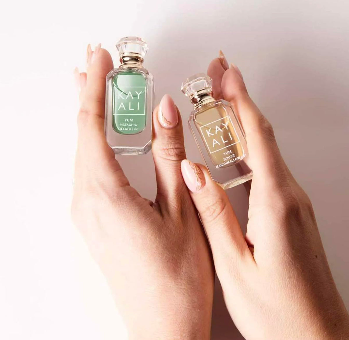 Close-up of KAYALI Mini Yum Pistachio Gelato | 33 Eau de Parfum Intense bottle