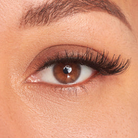 Close-up of KISS Pompadour False Eyelashes showing clear band