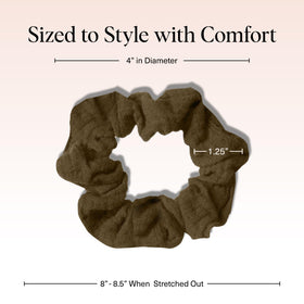 Close-up of Kitsch Moss Green scrunchies showing soft suede fabric