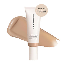 Close-up of Laura Mercier Tinted Moisturizer tube showing SPF 30