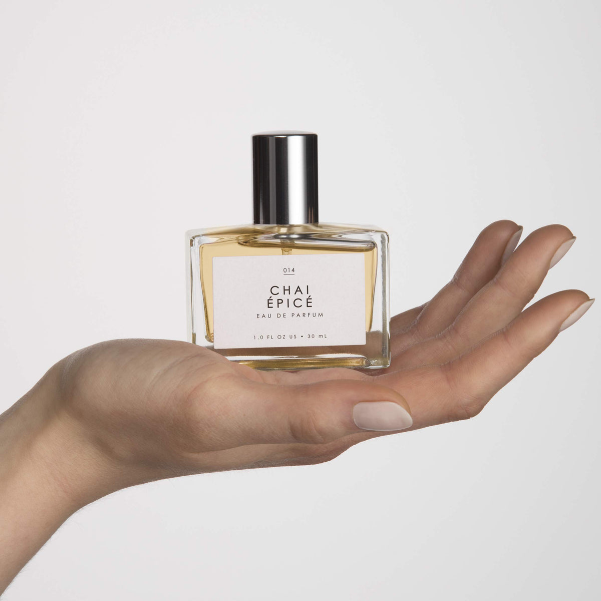 Close-up of Le Monde Gourmand Chai Épicé Eau de Parfum sprayer