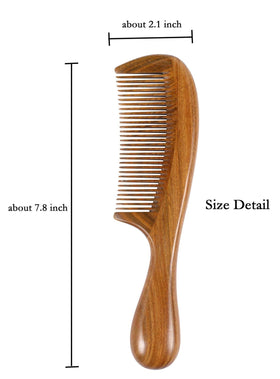 Close-up of Louise Maelys wide tooth wooden comb with natural wood grain