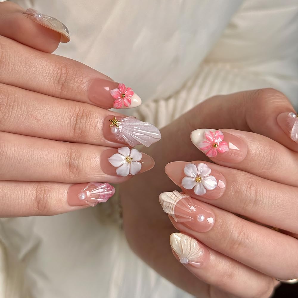 Close-up of MAGLFELL press on nails with floral design