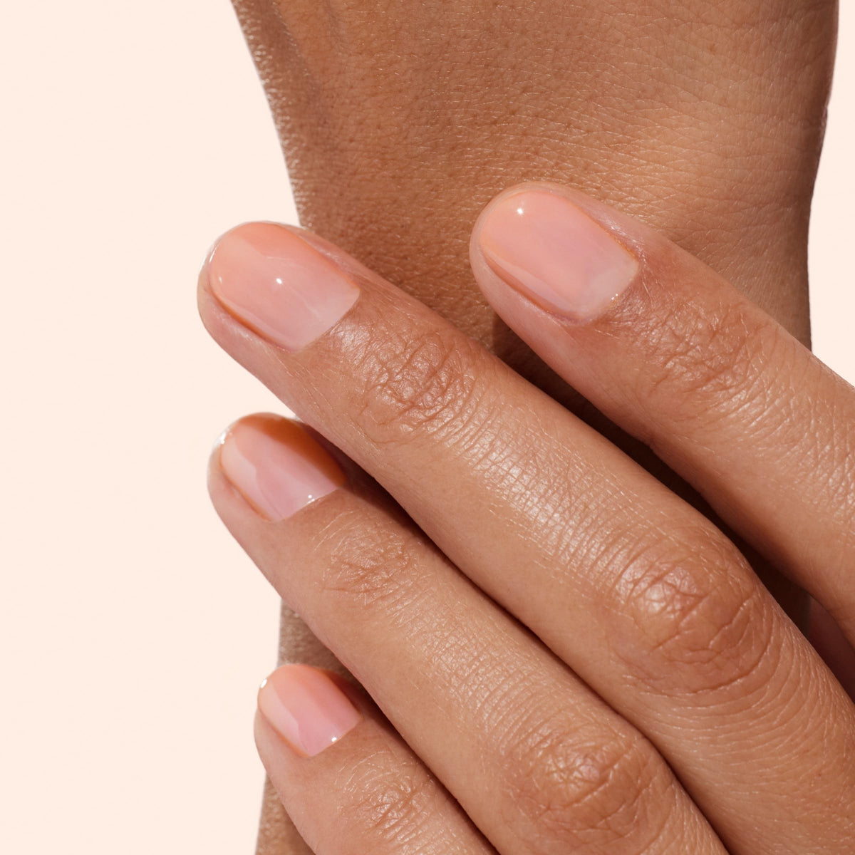 Close-up of Manucurist Active Glow Raspberry Nail Concealer brush