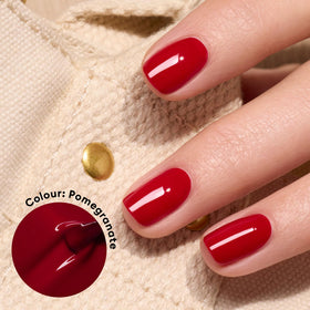 Close-up of Manucurist Green Pomegranate Raspberry Red Nail Polish brush