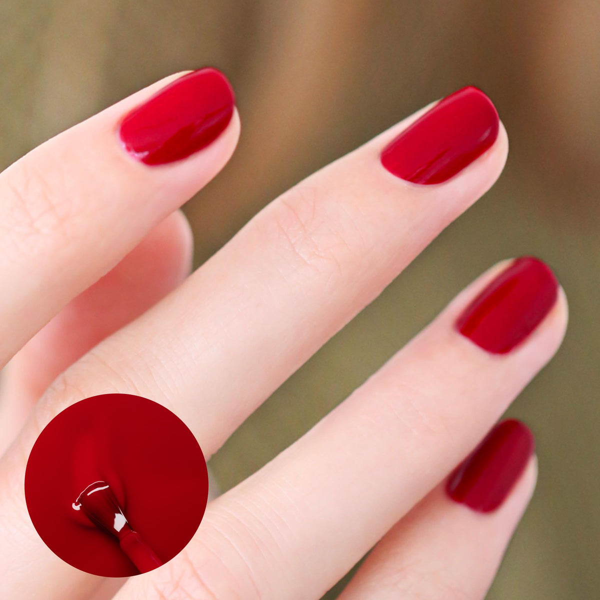 Close-up of Manucurist Green Red Cherry Nail Polish brush