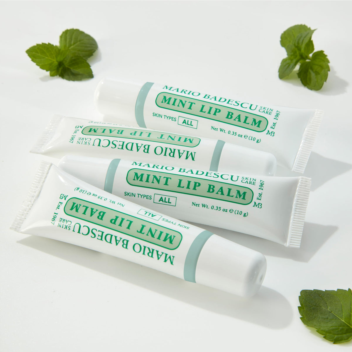 Close-up of Mario Badescu Original Lip Balm tube