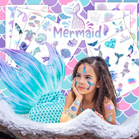 Close-up of mermaid temporary tattoos on a sheet