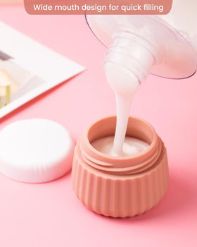 Close-up of Mrsdry silicone face cream jars in various colours