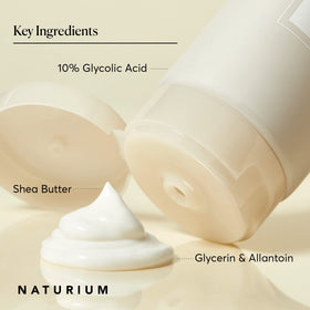 Close-up of Naturium Glycolic Body Lotion with shea butter ingredients
