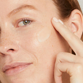 Close-up of No7 Restore & Renew Serum bottle