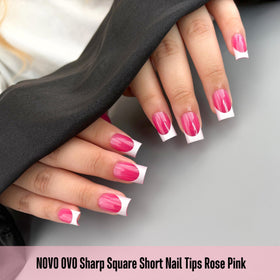 Close-up of NOVO OVO nail tips showing the French tip design