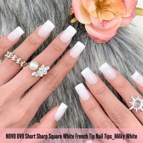 Close-up of NOVO OVO Short Sharp Square White French Tip Nail Tips