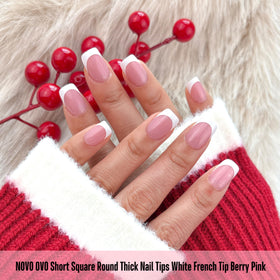 Close-up of NOVO OVO Short Square Round French Tip Nail Tips in assorted sizes