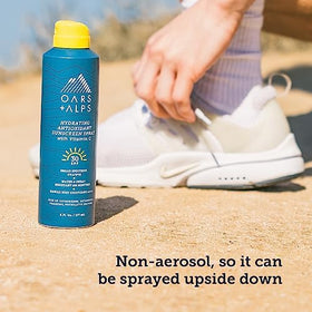 Close-up of Oars + Alps SPF 30 Body Sunscreen spray nozzle