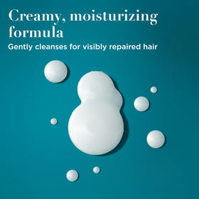 Close-up of OGX shampoo texture on hand