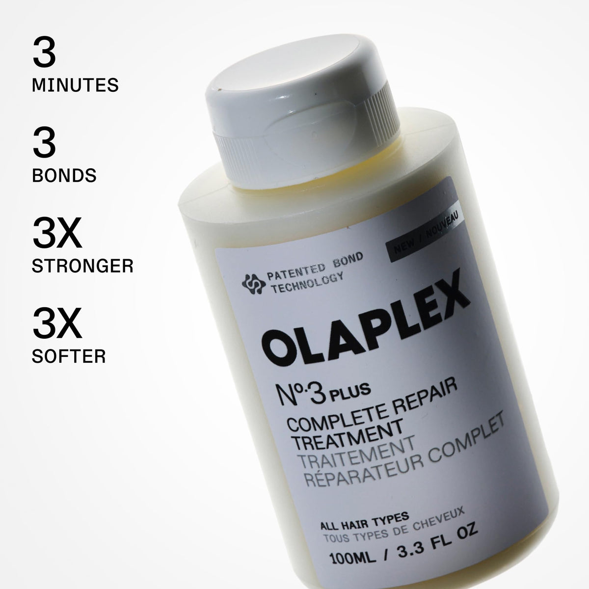 Close-up of Olaplex N°.3PLUS bottle with label